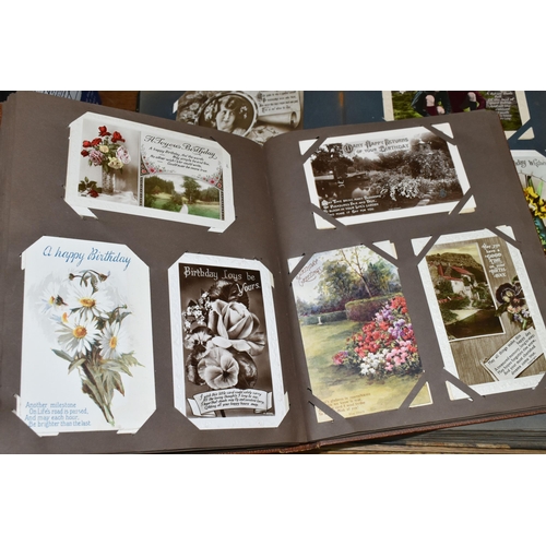 635 - TWO ALBUMS OF POSTCARDS containing approximately 490 mainly sentimental greeting type examples from ... 