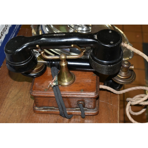 638 - A VINTAGE BAKELITE AND WOOD TELEPHONE AND SILVERPLATE COVERED SERVING DISH, the phone handset is mar... 