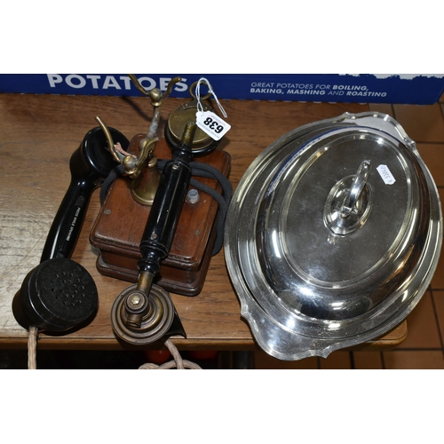 638 - A VINTAGE BAKELITE AND WOOD TELEPHONE AND SILVERPLATE COVERED SERVING DISH, the phone handset is mar... 