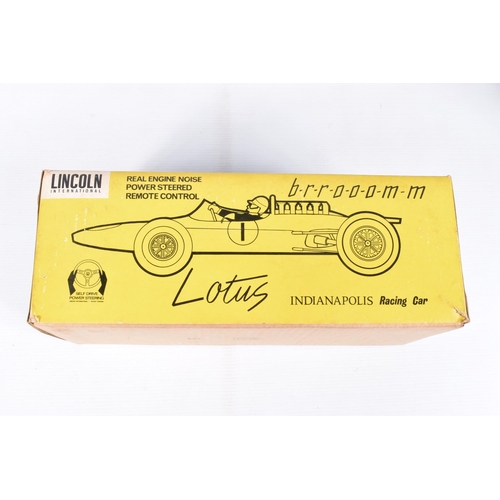 25 - A BOXED LINCOLN INTERNATIONAL PLASTIC BATTERY OPERATED LOTUS INDIANAPOLIS RACING CAR, No.7101, not t... 