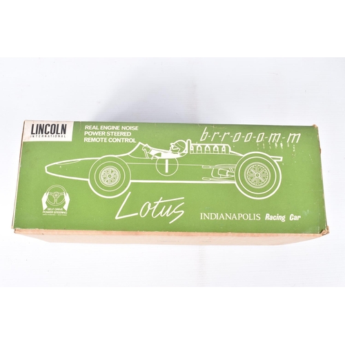 25 - A BOXED LINCOLN INTERNATIONAL PLASTIC BATTERY OPERATED LOTUS INDIANAPOLIS RACING CAR, No.7101, not t... 