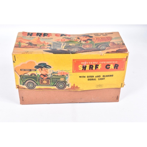 26 - A BOXED SHOWA TN TOYS TINPLATE BATTERY OPERATED SHERIFF CAR, not tested, appears complete and in goo... 