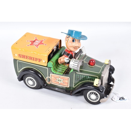 26 - A BOXED SHOWA TN TOYS TINPLATE BATTERY OPERATED SHERIFF CAR, not tested, appears complete and in goo... 