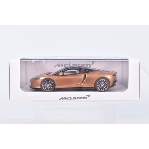 40 - FIVE BOXED  MCLAREN 1:43 SCALE MODELS to include  a Welly McLaren GT in Bronze, a McLaren GT 2019 in... 