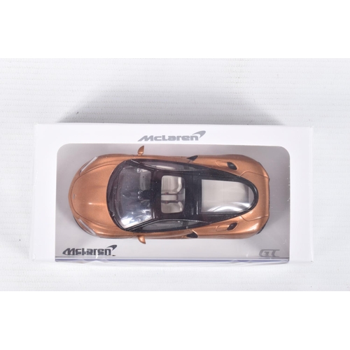 40 - FIVE BOXED  MCLAREN 1:43 SCALE MODELS to include  a Welly McLaren GT in Bronze, a McLaren GT 2019 in... 