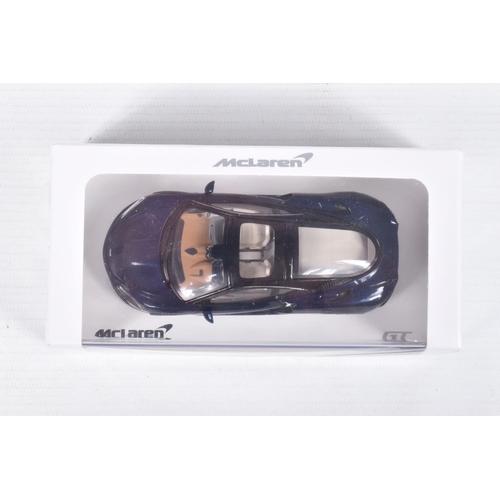 40 - FIVE BOXED  MCLAREN 1:43 SCALE MODELS to include  a Welly McLaren GT in Bronze, a McLaren GT 2019 in... 