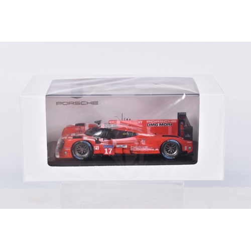 44 - FOUR BOXED 1:43 SCALE MODEL CARS to include a Porsche 919 Hybrid #19 winners Le Mans 2015 in white, ... 