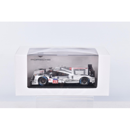 44 - FOUR BOXED 1:43 SCALE MODEL CARS to include a Porsche 919 Hybrid #19 winners Le Mans 2015 in white, ... 