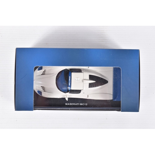 65 - FOUR BOXED DIECAST MODEL VEHICLES, the first is a Maserati MC12 numbered MOC041, Maserati sticker re... 