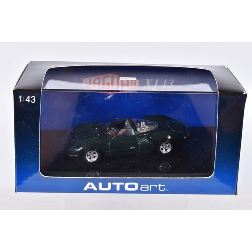 65 - FOUR BOXED DIECAST MODEL VEHICLES, the first is a Maserati MC12 numbered MOC041, Maserati sticker re... 