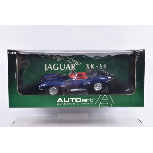 115 - TWO BOXED 1:18 SCALE DIECAST MODEL CARS, to include an Autoart Jaguar XK SS 1956 in blue, item no 73... 