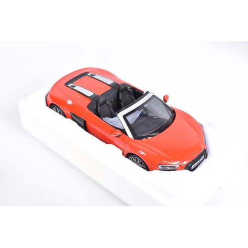 117 - TWO BOXED 1:18 SCALE DIECAST MODEL CARS, to include an I Scale Audi Ra Spyder V10 in Dynamite Red, i... 