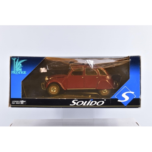 118 - FOUR BOXED SOLIDO 1:18 SCALE DIECAST MODEL CARS, to include a 1966 Citroen 2CV , item 8029, a Lotus ... 