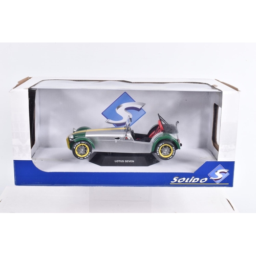 118 - FOUR BOXED SOLIDO 1:18 SCALE DIECAST MODEL CARS, to include a 1966 Citroen 2CV , item 8029, a Lotus ... 