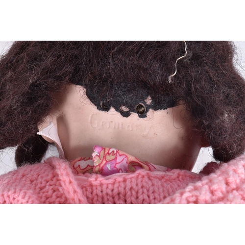 74 - A BISQUE HEAD DOLL, nape of neck marked 'Germany', wig stuck over any other marking, sleeping blue g... 