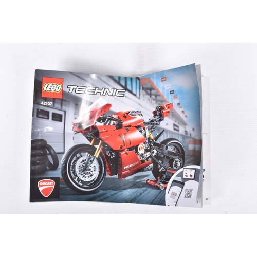 82 - A COLLECTION OF BUILT LEGO, to include a Lego technic Mobile Crane, number 42108, with booklet no bo... 