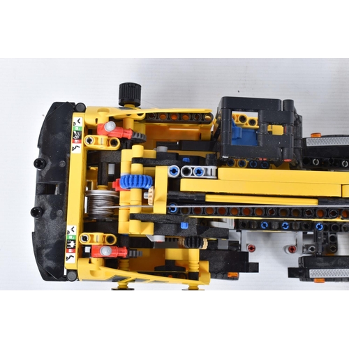 82 - A COLLECTION OF BUILT LEGO, to include a Lego technic Mobile Crane, number 42108, with booklet no bo... 