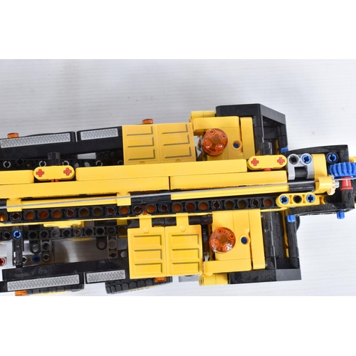 82 - A COLLECTION OF BUILT LEGO, to include a Lego technic Mobile Crane, number 42108, with booklet no bo... 