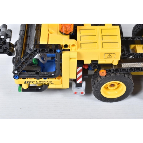 82 - A COLLECTION OF BUILT LEGO, to include a Lego technic Mobile Crane, number 42108, with booklet no bo... 