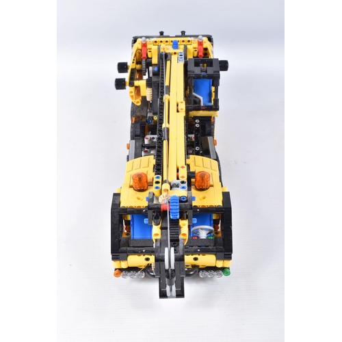 82 - A COLLECTION OF BUILT LEGO, to include a Lego technic Mobile Crane, number 42108, with booklet no bo... 