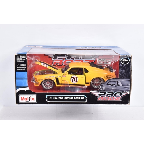 158 - NINE  BOXED AMERICAN BRANDED 1:24 SCALE DIECAST MODEL VEHICLES, to include a  New Ray Dodge Charger ... 