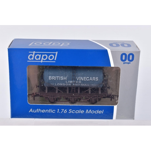 267 - ELEVEN BOXED OO GAUGE DAPOL TANKERS, to include two of the Culm Valley Dairy Co tankers, British Vin... 