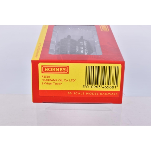 273 - TWELVE BOXED OO GAUGE HORNBY MODEL RAILWAYS ROLLING STOCK to include a 6 Wheel Milk Tank, United Dai... 