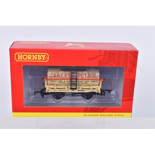 274 - TWELVE BOXED OO GAUGE HORNBY MODEL RAILWAYS ROLLING STOCK, to include a 6 Wheel Milk Tank 'Express D... 