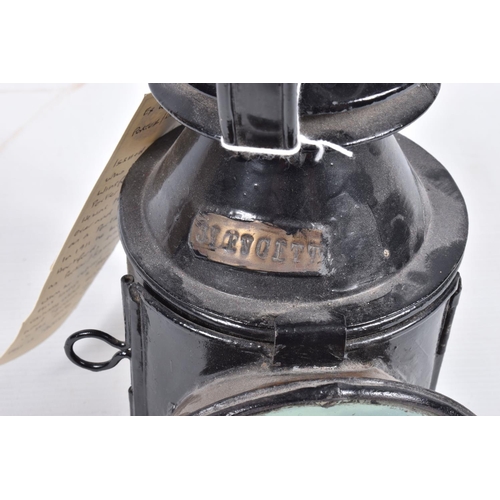 303 - AN L.M.S. RAILWAY THREE ASPECT HAND LAMP, complete with reservoir and burner (both stamped L.M.S.)an... 