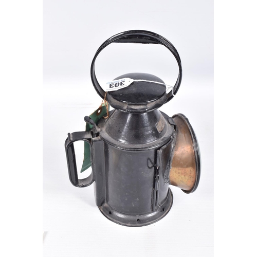 303 - AN L.M.S. RAILWAY THREE ASPECT HAND LAMP, complete with reservoir and burner (both stamped L.M.S.)an... 