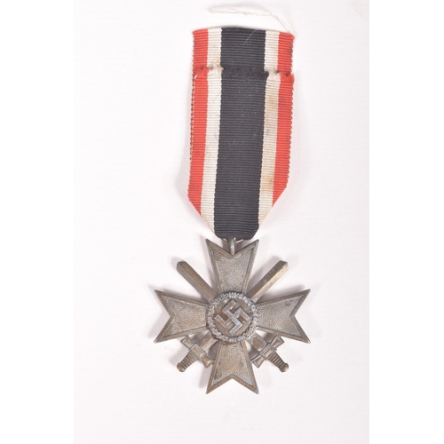 354 - A GERMAN SA SPORTS BADGE AND A WAR MERIT CROSS WITH SWORDS, the SA badge is 1st pattern and was prod... 