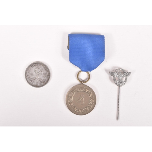 363 - A GERMAN ARMY FOUR YEAR SERVICE MEDAL, a German coin and a stickpin, the medal comes complete with i... 