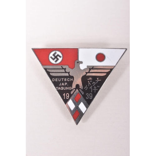 364 - A COLLECTION OF GERMAN PIN BADGES, they include a 1939 and 1944 Japan and Germany alliances badges, ... 