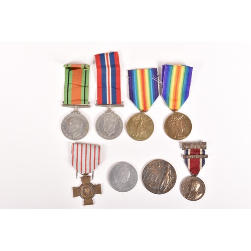 366 - A SELECTION OF WWI AND WWII MEDALS, to include a WWII 1939-45 medal and defence medal, both un-named... 