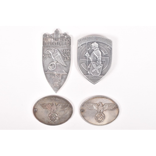 390 - FOUR GERMAN ITEMS TO INCLUDE A GAUTAG TINNIE, two Gestapo tags and a Nurnberg shield, the Gestapo ta... 