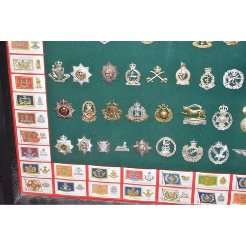 465 - A LARGE FRAMED COLLECTION OF MILITARY CAP BADGES AND COLLAR DOGS, from a wide range of British Army ... 