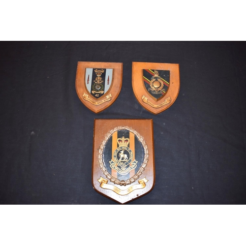 467 - MILITARY AND AIRFORCE INTEREST, a group of framed prints, plaques, pennants, plate, etc, including p... 