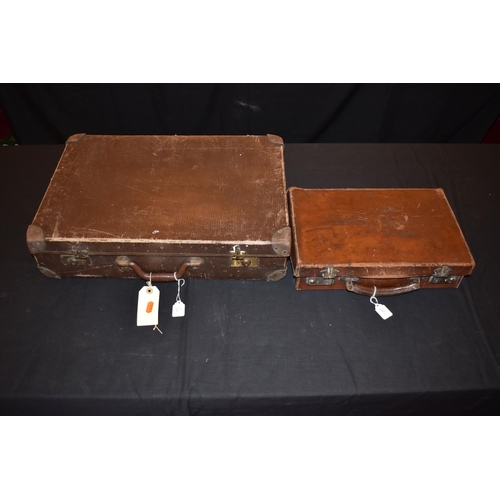 469 - TWO VINTAGE SUITCASES AND A TRAVELLING TRUNK, the trunk was sent to a Dr Fletcher in Worcestershire ... 