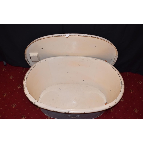 471 - A HOME FRONT STEEL BATH WITH ORIGINAL TOP, this bath is cream in colour on the lid and inside with a... 