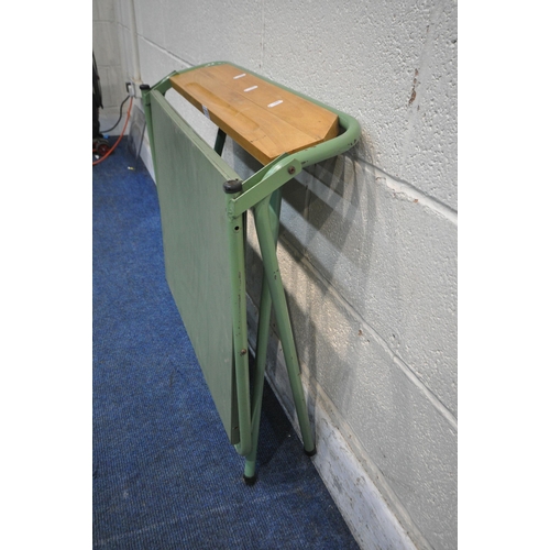 1218 - A GREEN PAINTED FOLDING TUBULAR METAL CHILDS REVOLVING CHALK BOARD, with a beech shelf, width 64cm x... 