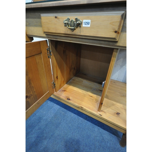 1250 - A MODERN PINE WASH STAND, with a raised tiled back, a glass surface protector, a single dummy drawer... 