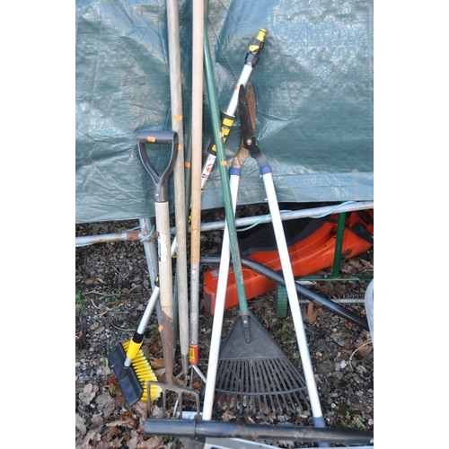 1006 - A BUILDERS WHEELBARROW, two aluminium step ladders, and a quantity of garden tools (12+)