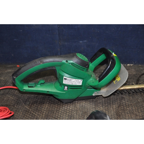 1055 - A GARDENLINE CORDLESS HEDGE TRIMMER with one battery and charger and a Gardenline 240v hedge trimmer... 