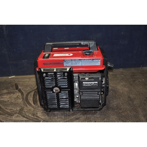 1061 - A HONDA EX800 PORTABLE PETRO GENERATOR with 240v outlets ( engine pulls freely but hasn't been start... 