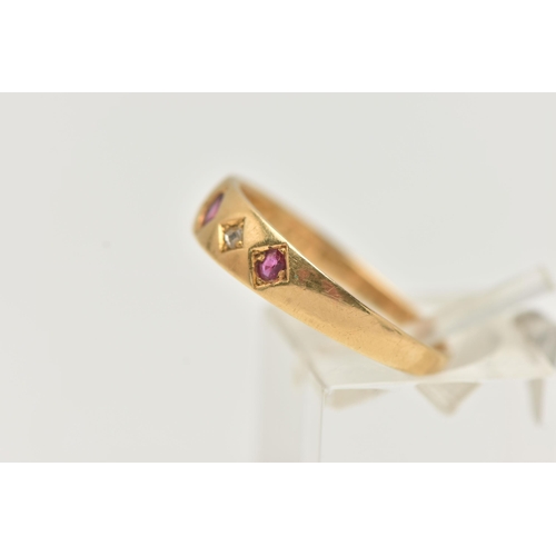 2 - A LATE VICTORIAN YELLOW METAL, RUBY AND DIAMOND RING, designed with a row of three circular cut rubi... 