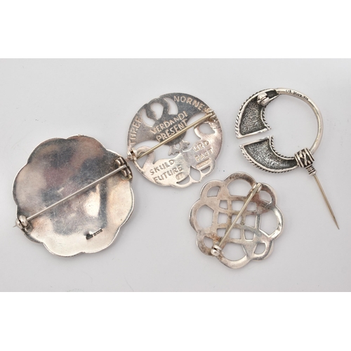 22 - FOUR CELTIC PATTERN BROOCHES, to include a large Celtic pattern circular brooch, fitted with a brooc... 