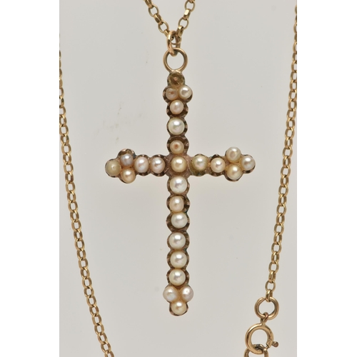 42 - AN EARLY 20TH CENTURY SEED PEARL CROSS PENDANT AND A 9CT GOLD CHAIN, a rose metal cross set with twe... 