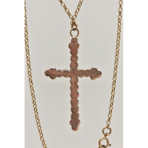 42 - AN EARLY 20TH CENTURY SEED PEARL CROSS PENDANT AND A 9CT GOLD CHAIN, a rose metal cross set with twe... 