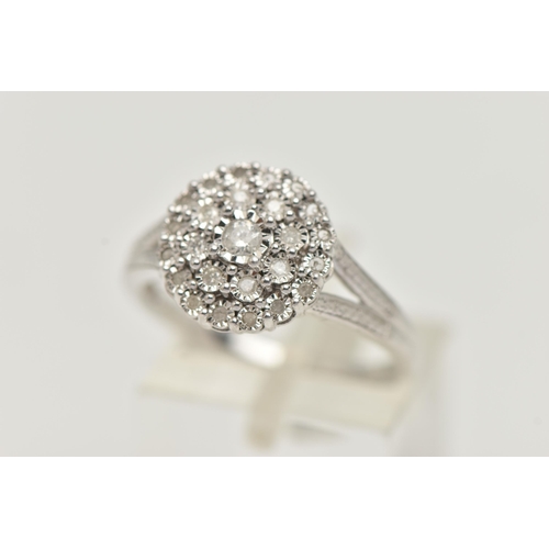 6 - A WHTE METAL DIAMOND CLUSTER RING, circular cluster set with round brilliant and single cut diamonds... 