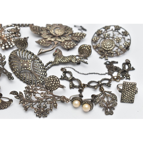 62 - AN ASSORTMENT OF WHITE METAL AND MARCASITE MID CENTURY JEWELLERY, to include six brooches, two rings... 